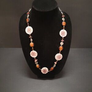Necklace Featuring Brown Amber Patterned Beads & Silver Toned Metal Accents